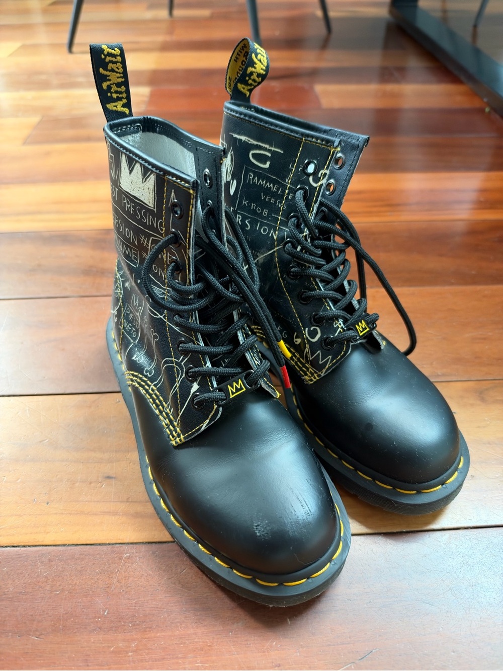 Dr. Martens Black Leather Combat Boots with Yellow Stitching